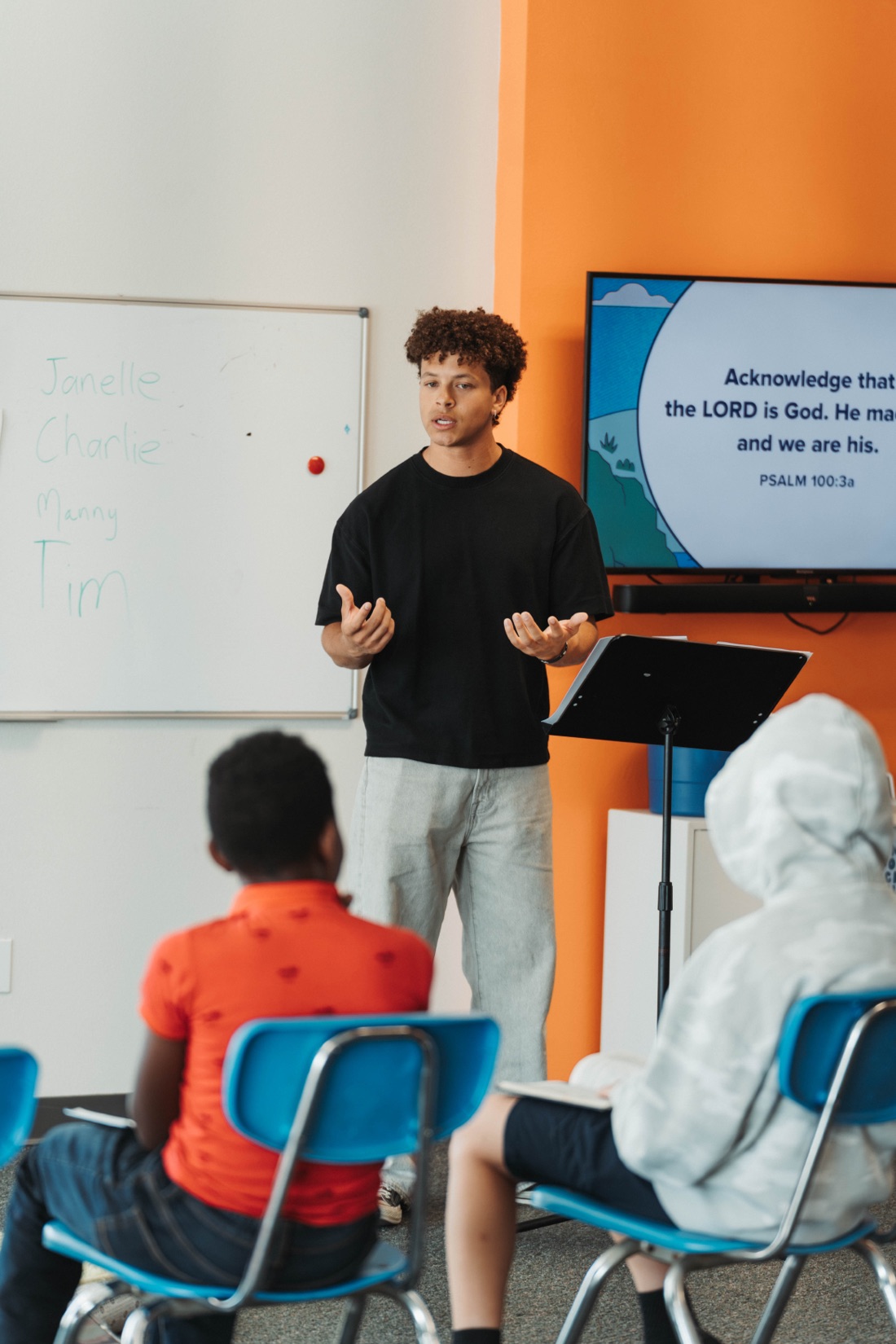 Charlie Pickard teaching a group of students in a ministry setting